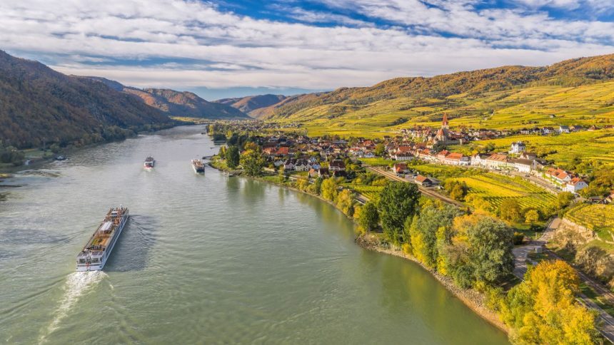 Ships make their way along the Danube River near Weissenkirchen in Austria. European river cruises are a great value right after Thanksgiving into the first two weeks of December, one travel expert says.