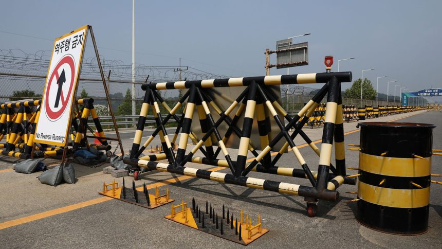 Barricades are placed near the Unification Bridge leading to Panmunjom in the Demilitarized Zone (DMZ) on June 11, 2024 in Paju, South Korea.