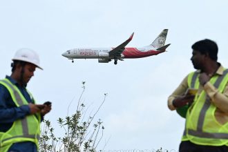 An Air India Express aircraft prepares to land at Kempegowda International Airport in Bengaluru on September 4, 2024.