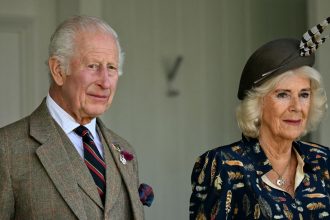 Britain's King Charles III and Britain's Queen Camilla attend the annual Braemar Gathering in Braemar, central Scotland, on September 7, 2024.