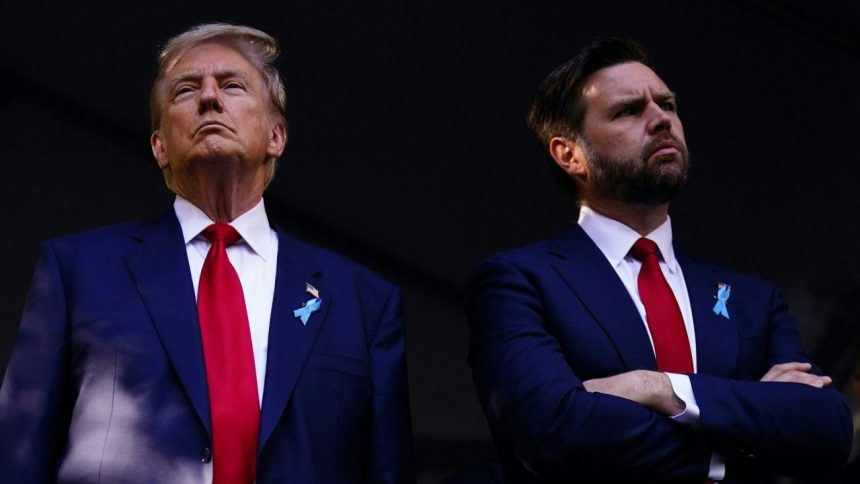 Former US President and Republican presidential candidate Donald Trump (L) and US Senator from Ohio and Republican vice presidential candidate J.D. Vance attend a remembrance ceremony on the 23rd anniversary of the September 11 terror attack on the World Trade Center at Ground Zero, in New York City on September 11, 2024. (Photo by Adam GRAY / AFP)