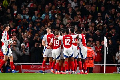 Bukayo Saka celebrates his goal with teammates during the UEFA Champions League match between Arsenal and Paris Saint Germain at Emirates Stadium.