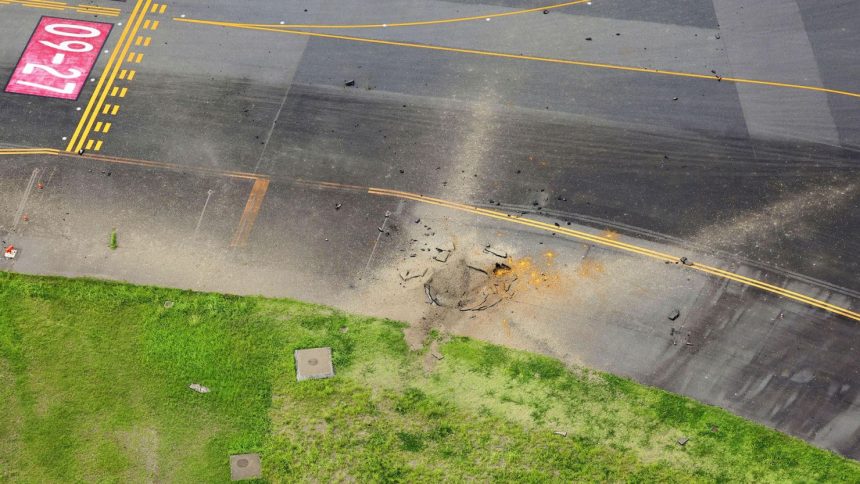 A crater from the explosion at Miyazaki Airport