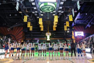 The San Jose State University Spartans line up for the playing of the national anthem before a game against the Colorado State University Rams in October.