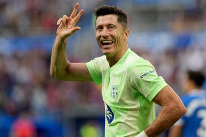 Lewandowski celebrates after scoring a hat-trick for Barcelona.