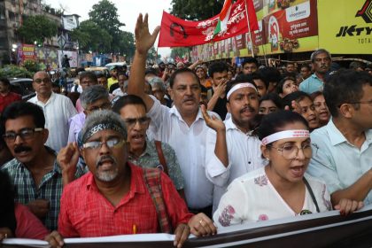 Doctors and citizens shout slogans during a protest march while junior doctors hold a hunger strike to protest against the rape and murder of a doctor trainee at RG Kar Medical College & Hospital in Kolkata, India, on October 8.