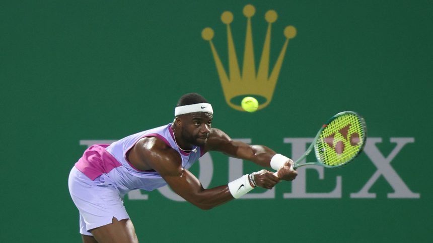 Frances Tiafoe plays a backhand against Roman Safiullin in the third round of the Shanghai Masters.