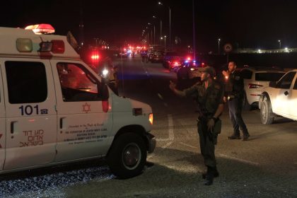 Emergency services personnel attend the scene of a drone strike on October 13, 2024 in Binyamina, Israel. Initial reports suggest at least 40 people were injured near Binyamina, Israel, following a drone strike launched by Hezbollah.