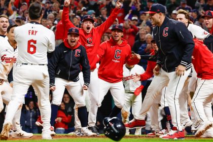 Cleveland Guardians celebrate a walk-off home run victory against the New York Yankees.