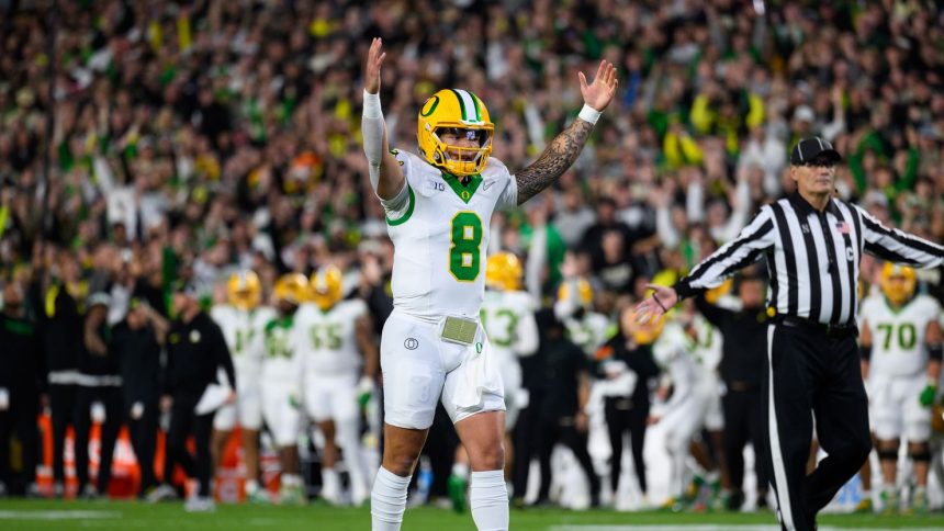 WEST LAFAYETTE, IN - OCTOBER 18: Oregon Ducks quarterback Dillon Gabriel (8) celebrates a touchdown during the college football game between the Purdue Boilermakers and Oregon Ducks on October 18, 2024, at Ross-Ade Stadium in West Lafayette, IN. (Photo by Zach Bolinger/Icon Sportswire via Getty Images)