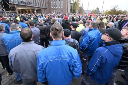 Volkswagen employees gather to hear from the automaker's works council at the company's headquarters in Wolfsburg, Germany on October 28, 2024.