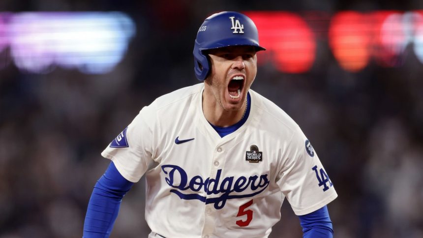 Freddie Freeman of the Los Angeles Dodgers celebrates after hitting a walk-off grand slam during the tenth inning against the New York Yankees during Game 1 of the 2024 World Series at Dodger Stadium in Los Angeles, California, on October 25, 2024.