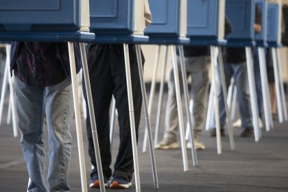 Voters cast their ballots during Michigan's early voting period on October 29, 2024 in Dearborn, Michigan.