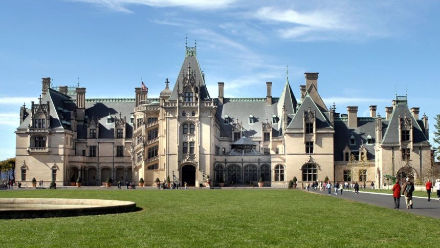 The 175,000-square-foot Biltmore House, photographed before Helene pummeled North Carolina, was largely unscathed by the storm. But other parts of Biltmore Estate had "significant flooding and damage to buildings," the Biltmore said.