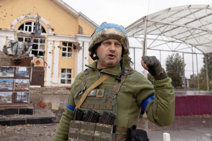 A Ukrainian soldier stands in Sudzha, Russia, on October 8 — months into the country's surprise incursion.