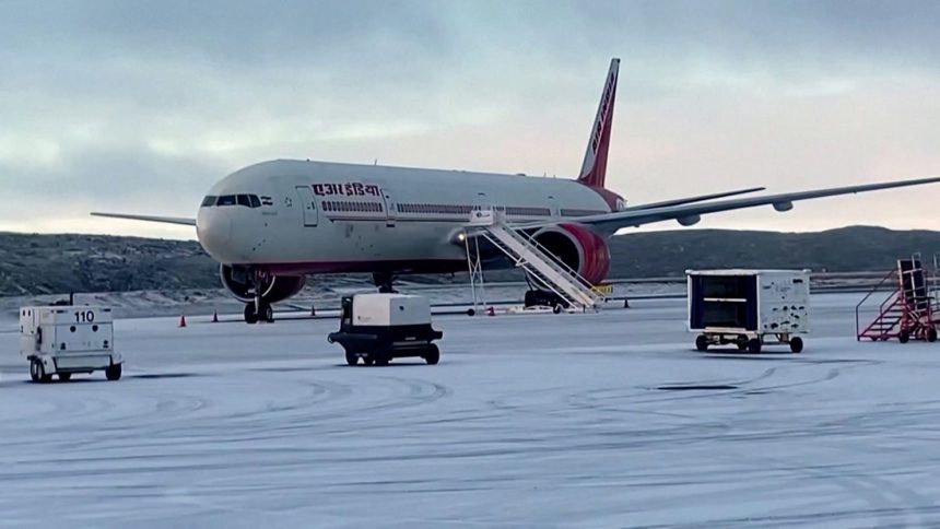 An Air India plane sits on the runway in Iqaluit, Canada, on October 15, after making an emergency landing due to a bomb threat.