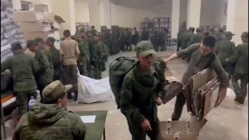 Video provided to CNN by the Ukrainian Center for Strategic Communication and Information Security appears to show North Korean soldiers receiving Russian uniforms and equipment at the Sergeevka Training Ground in the Far East of Russia.