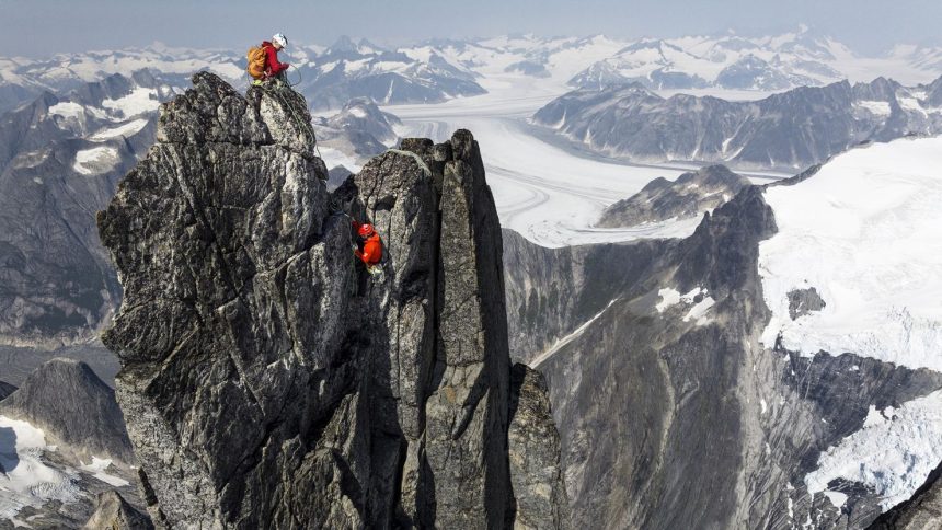 An aerial view of Tommy Caldwell and Alex Honnold on the summit of the West Cat's Ear Spire.