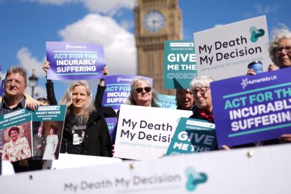 Activists support assisted dying in Westminster in April. Friday's vote is the culmination of a years-long campaignn.