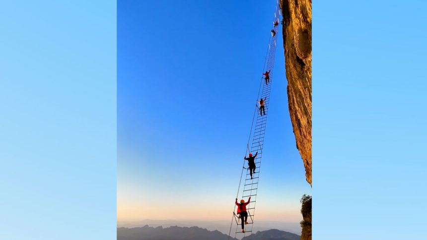 Travelers climbing the "sky ladder."