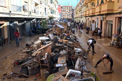 Debris piled up along a street on November 1, 2024, following the devastating effects of flooding on the town of Paiporta, in the region of Valencia, eastern Spain.