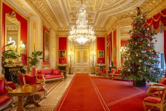 A Christmas tree in the Crimson Drawing Room – one of the most elaborate rooms in Windsor Castle, England