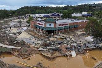 A drone view shows a damaged area following the passing of Hurricane Helene, in Asheville, North Carolina, on September 29, 2024.