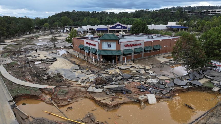 A drone view shows a damaged area following the passing of Hurricane Helene, in Asheville, North Carolina, on September 29, 2024.