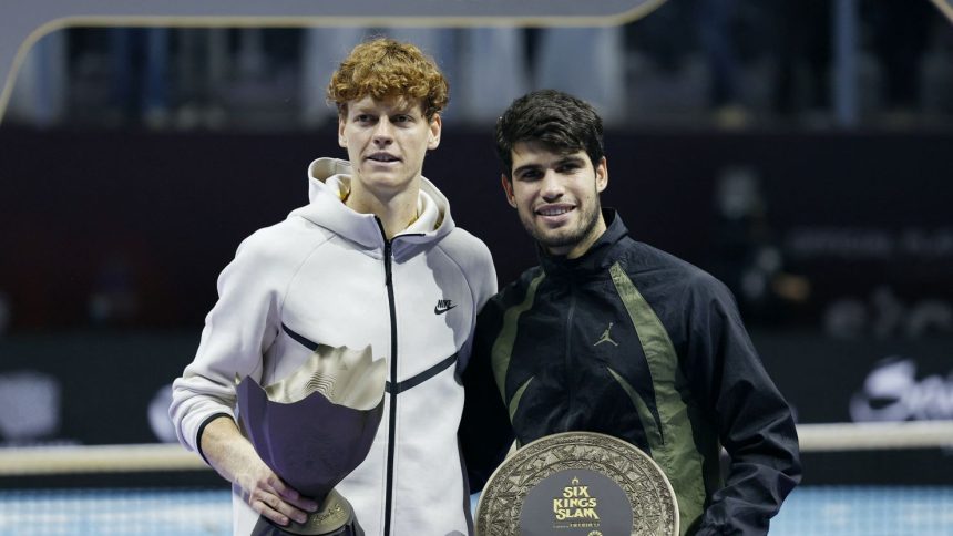 Tennis - 6 Kings Slam - Riyadh, Saudi Arabia - October 19, 2024 Italy's Jannik Sinner posses with the trophy after winning the final alongside Spain's Carlos Alcaraz REUTERS/Hamad I Mohammed