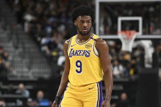 Oct 15, 2024; Las Vegas, Nevada, USA; Los Angeles Lakers guard Bronny James (9) looks on against the Golden State Warriors in the fourth quarter during a preseason game at T-Mobile Arena. Mandatory Credit: Candice Ward-Imagn Images