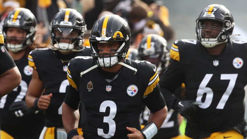 Nov 17, 2024; Pittsburgh, Pennsylvania, USA; Pittsburgh Steelers quarterback Russell Wilson (3) leads the team onto the field to play the Baltimore Ravens at Acrisure Stadium. Mandatory Credit: Charles LeClaire-Imagn Images