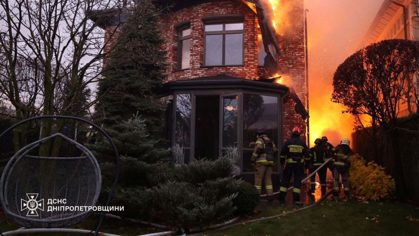 Firefighters work at the site of a Russian missile strike in Dnipro, Ukraine on Thursday.