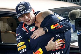 Red Bull's Max Verstappen celebrates after winning the 2024 F1 world championship title at the Las Vegas Grand Prix.