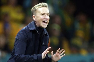 FILE - Canada's head coach Bev Priestman gestures during the Women's World Cup Group B soccer match between Australia and Canada in Melbourne, Australia, Monday, July 31, 2023. FIFA deducted six points from Canada in the Paris Olympics women’s soccer tournament and banned three coaches, including Priestman, for one year each on Saturday, July 27, 2204, in a drone spying scandal. (AP Photo/Hamish Blair, File)