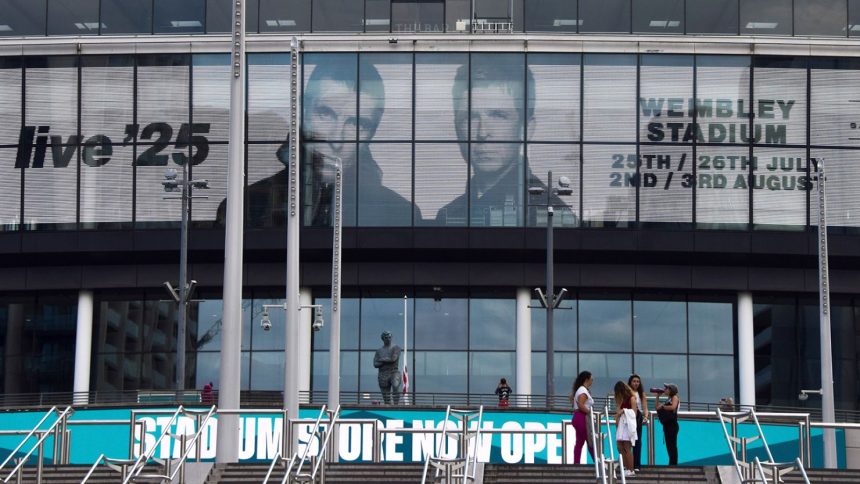 Screens at London's Wembley Stadium advertise Oasis concerts scheduled at the venue in summer 2025.