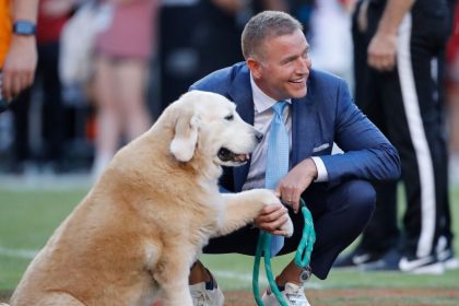 Football analyst Kirk Herbstreit and Ben ahead of October's Tennessee Volunteers and Arkansas Razorbacks football game.