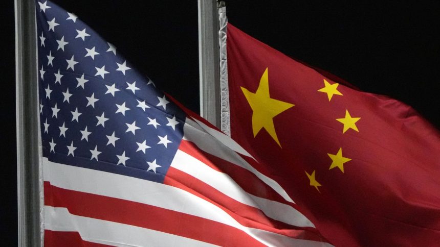 The American and Chinese flags wave at Genting Snow Park, February 2, 2022, in Zhangjiakou, China.