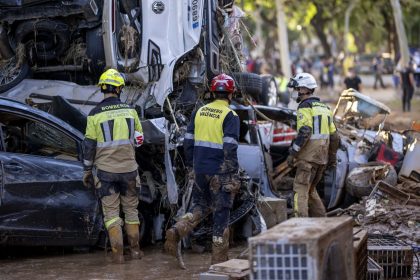 Firefighters search for people among cars in Alfafar, Valencia, on November 2.