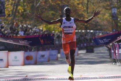 Abdi Nageeye, of the Netherlands, crosses the finish line to win the men's race.