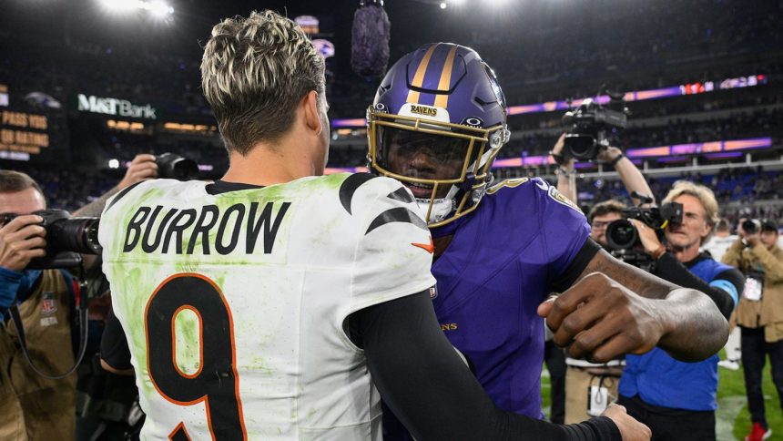 Cincinnati Bengals quarterback Joe Burrow  and Baltimore Ravens quarterback Lamar Jackson (8) embrace after the game.