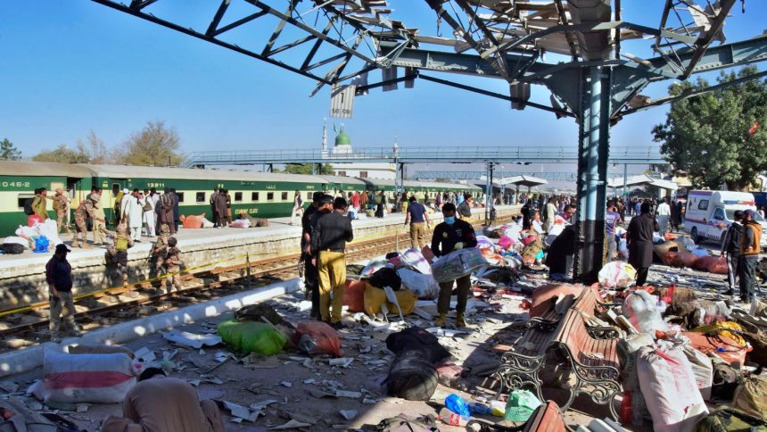 Security officials examine the site of a bomb explosion at railway station in Quetta, southwestern Pakistan, on November 9, 2024.