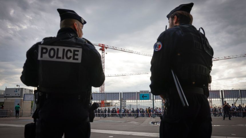 Police officers stand guard ahead of the 2022 UEFA Nations League soccer match between France and Denmark at the Stade de France in Saint Denis near Paris.