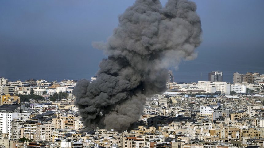 Smoke rises after an Israeli airstrike on Dahiyeh, in the southern suburb of Beirut, Lebanon, Saturday, Nov. 16, 2024.