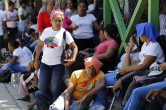 Relatives of those detained during a crackdown on protests following the Venezuelan election wait for their loved ones to be released at the Yare 3 prison in San Francisco de Yare on Nov. 16, 2024.