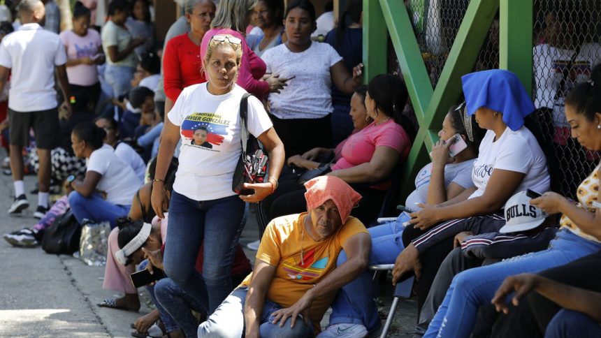 Relatives of those detained during a crackdown on protests following the Venezuelan election wait for their loved ones to be released at the Yare 3 prison in San Francisco de Yare on Nov. 16, 2024.