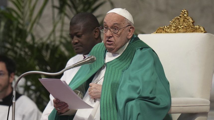 Pope Francis delivers his speech during a mass on the occasion of the World Day of the Poor in St. Peter's Basilica, at the Vatican on Sunday.