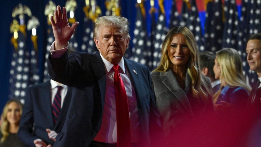 President-elect Donald Trump waves while walking off stage following early results from the 2024 presidential election in Palm Beach County Convention Center, in West Palm Beach, Florida, on November 6.