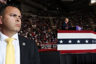 A Secret Service agent watches as Donald Trump speaks at a campaign appearance on July 31 in Harrisburg, Pennsylvania.