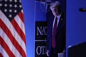 In this 2018 photo, then-President Donald Trump arrives to speak to the media at a press conference on the second day of the 2018 NATO Summit on July 12, 2018 in Brussels, Belgium.