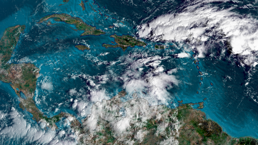 Disorganized, stormy weather churns in the Caribbean Sea on Friday morning. The storminess is likely to organize into a tropical system by late weekend or early next week.